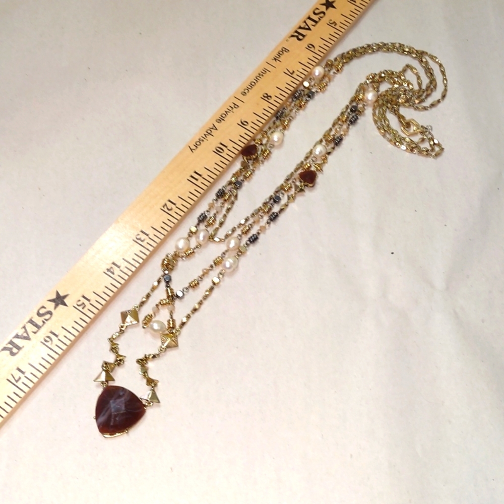 Gold tone beaded necklace